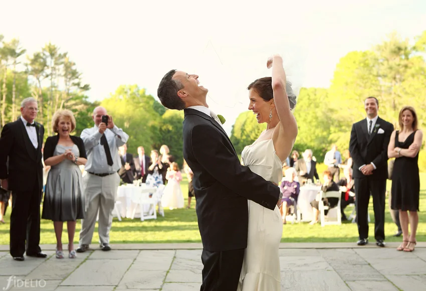 bride and groom laughing