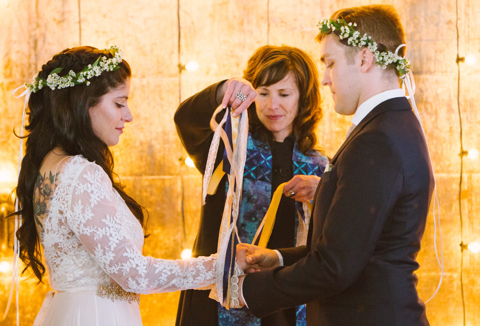 rev erika hewitt marries a bride and groom in maine