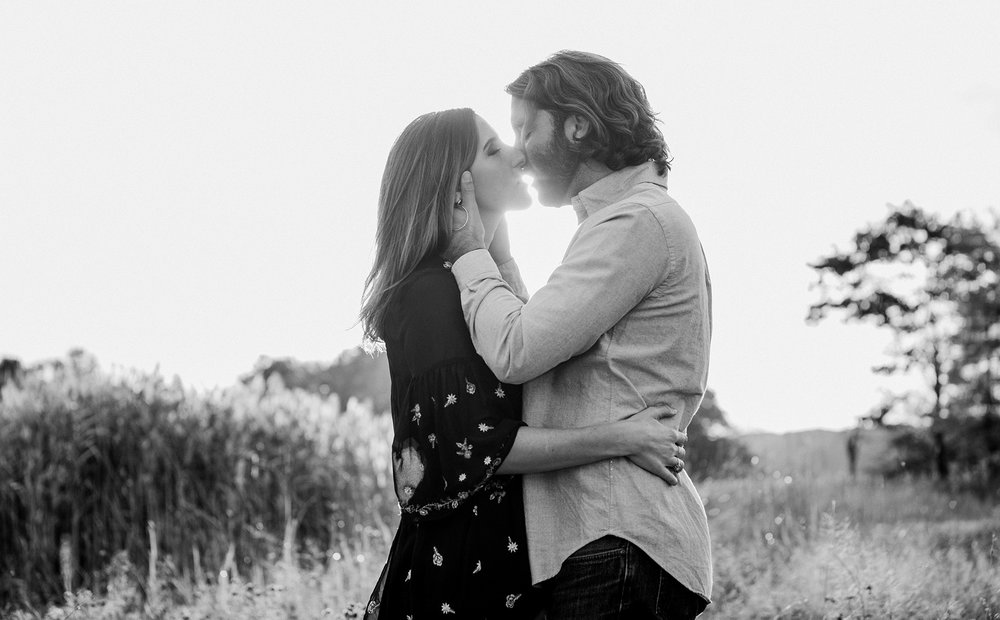  A romantic kiss in a field in Maine 