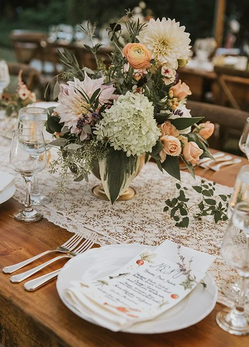 A wedding place setting with beautiful flowers
