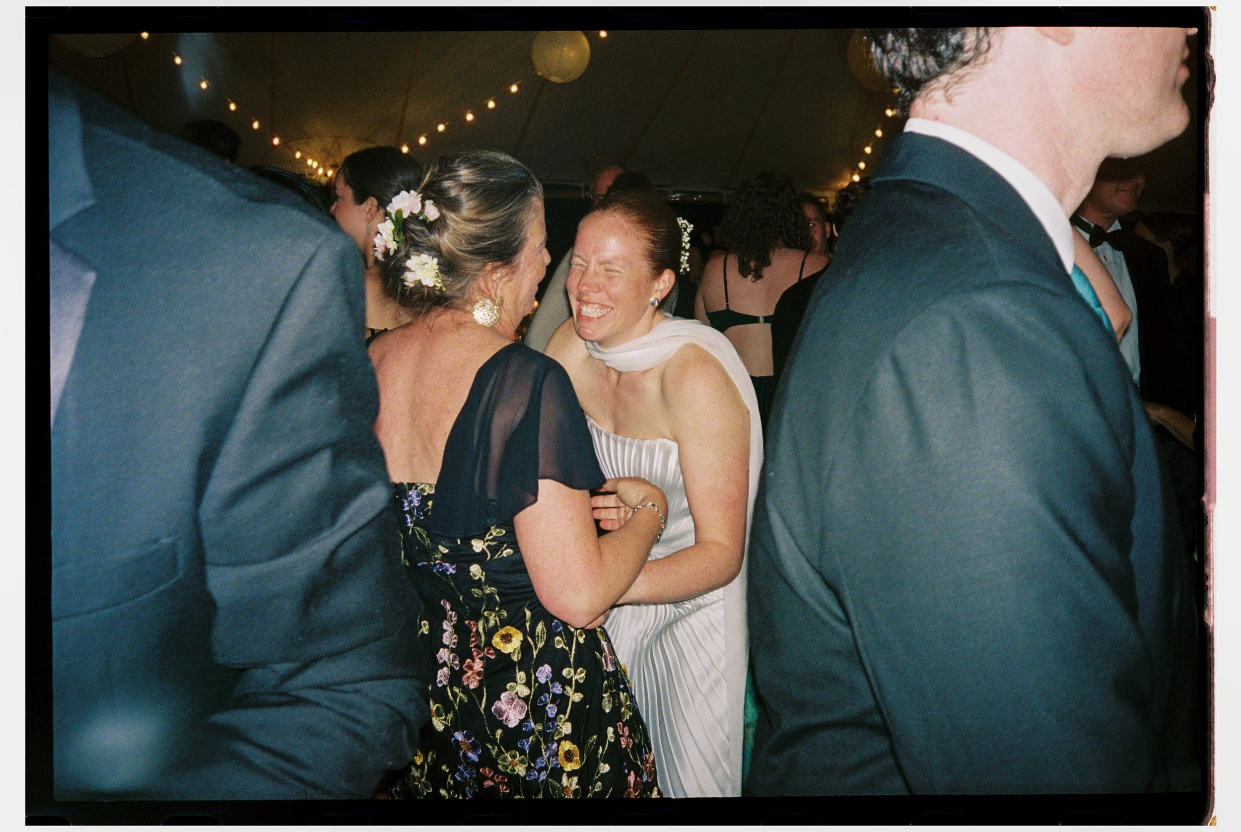 People dancing and enjoying themselves at a party or celebration.