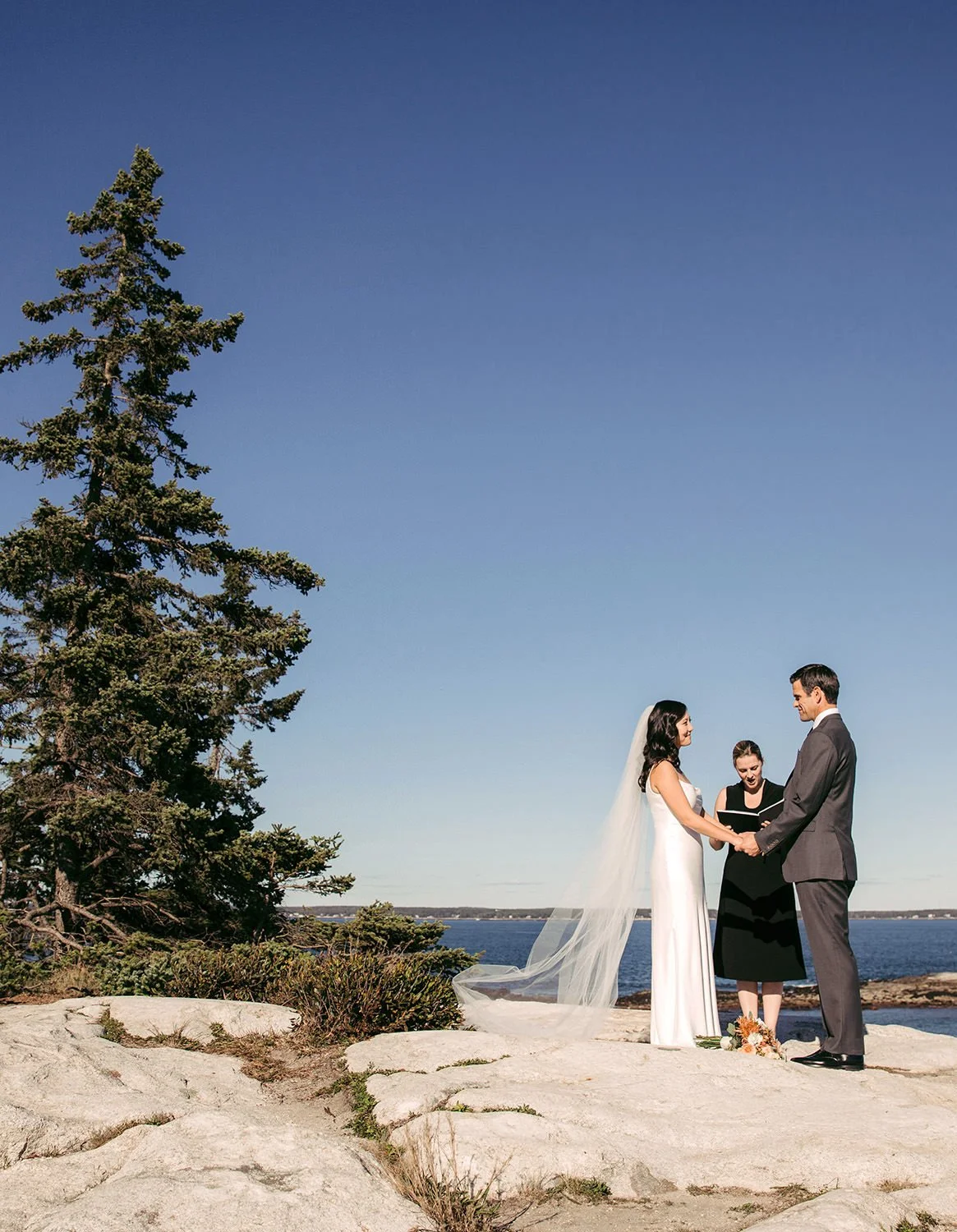A couple elopes at Reid State Park in Maine