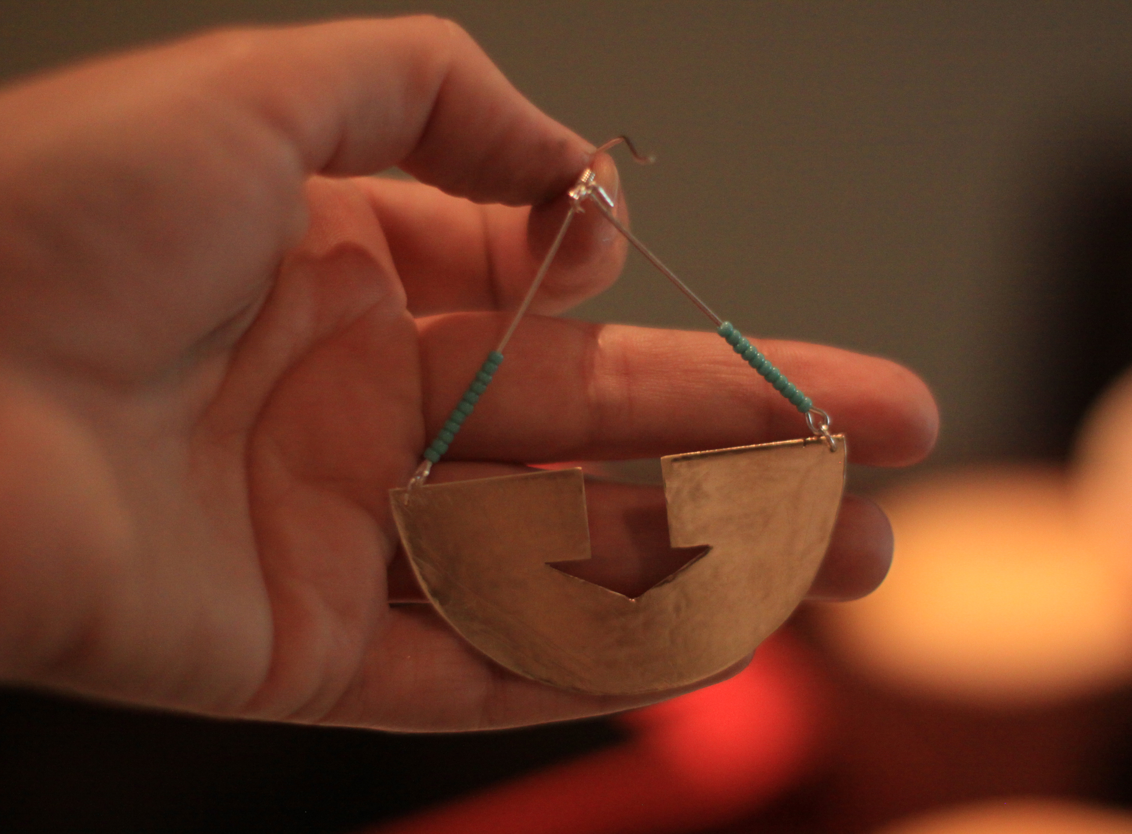 7. One finished earring! Design - 11:11 earring designed and created by East of the Sun Denise and Shane Faddis