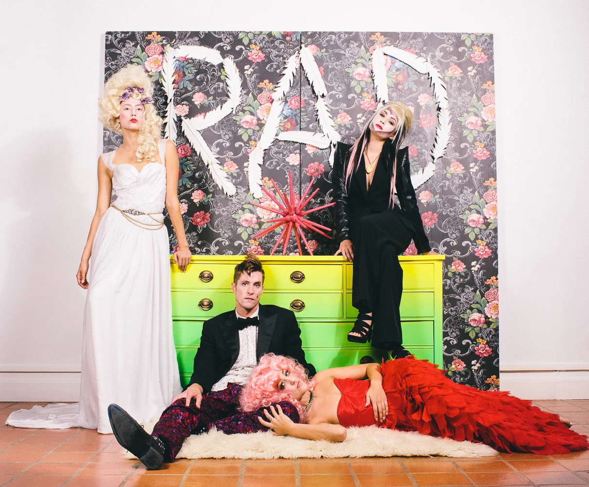 Model: Olivia Jordan, James Hans, Stephanie Slayton, Kaylene Ball / Clothing: Ivana Krejci (white gown), Ross Bennett (tuxedo), Jessica Ciarla (red gown), Daniel Esquivel (black suit) / Jewelry: Eliza Page / Belt: Lauren Checchio