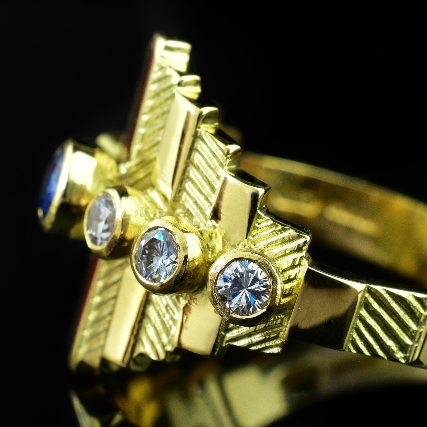 Closer look at the details of this recent commission.
Rich 18ct yellow gold with our distinctive ancient aesthetic. The diamonds and sapphire are  set in heavy beaten settings on top of a wide tapered band.  The ring features our classic ancient trea