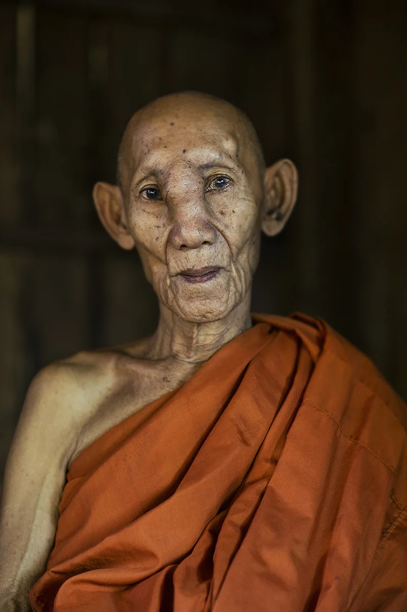 11202013-Monk-Beng-Pok-in-his-chamber-Phnom-Sampeau-Battambang-Cambodia-cutdown.jpg