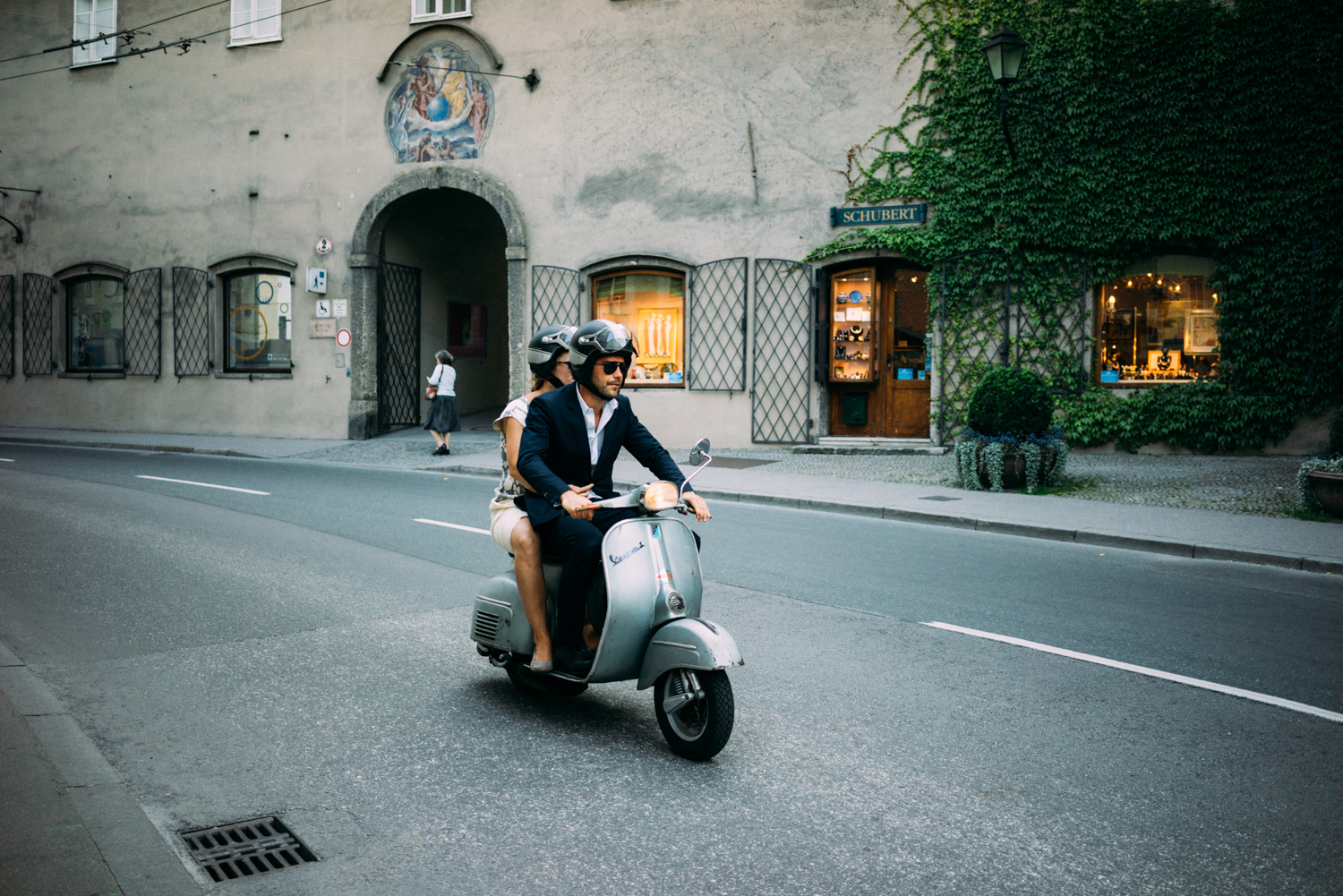 Looking slick on a moped.