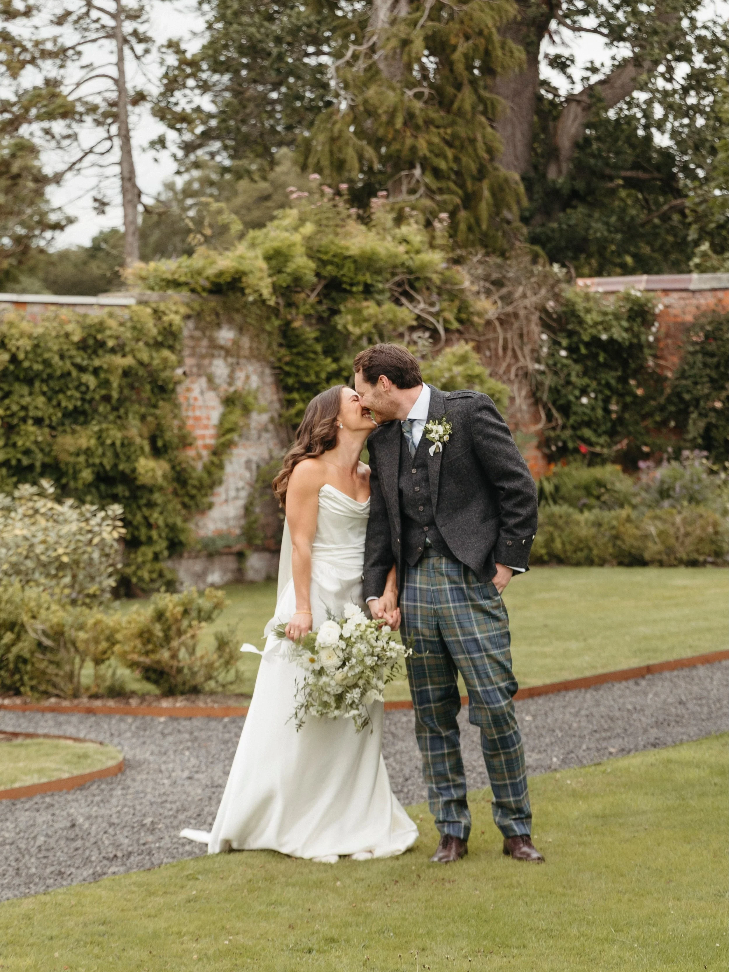 Last weekend in the wonderful @dunsinnan estate walled garden with Rachel &amp; Stevie. A magical day in the most amazing setting ❤️
.
.
.
#perthshirewedding #modernbride #scottishwedding #edinburghweddingphotographer #summerweddings 

Photographer: 