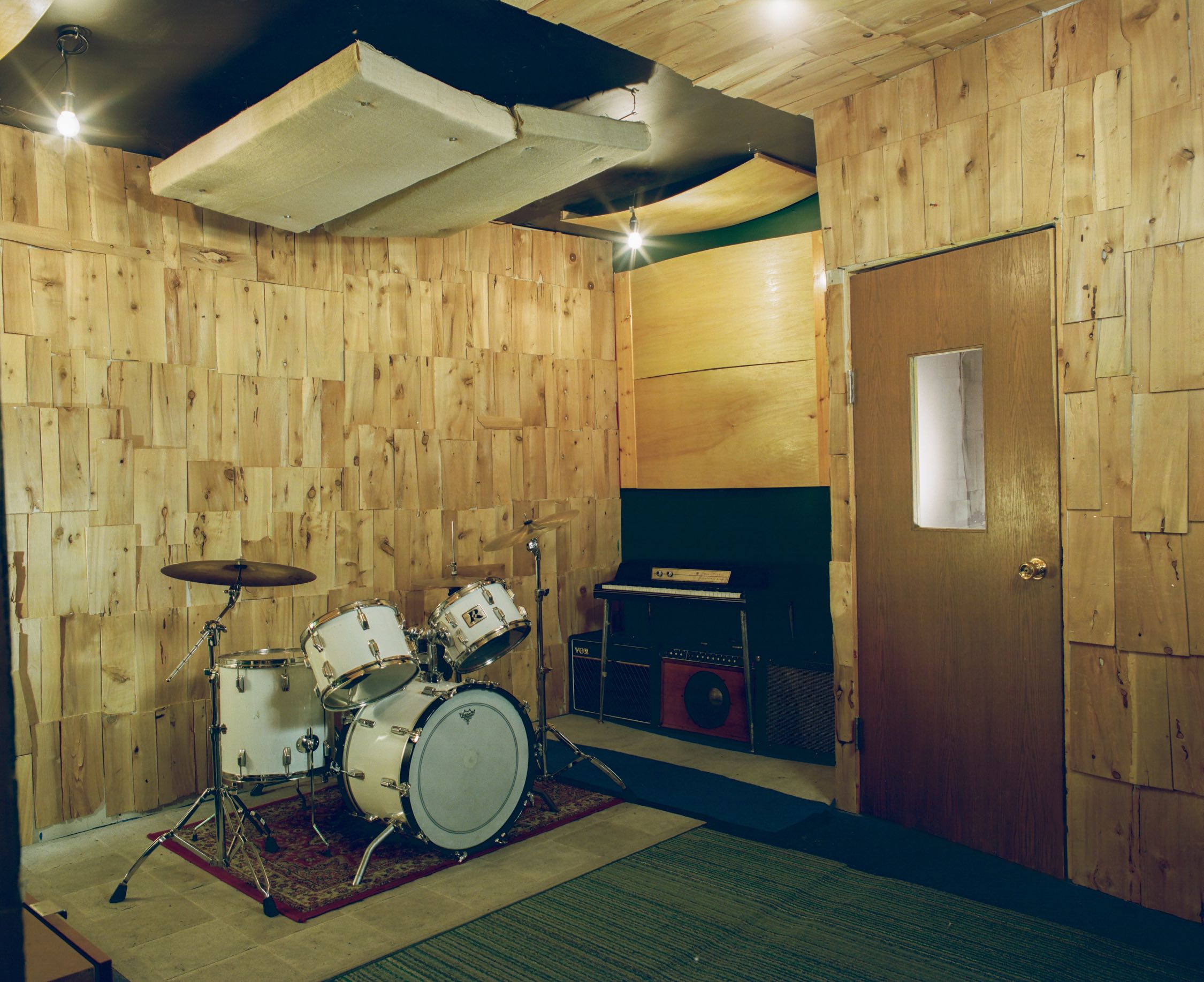 Live Room of Look to Listen Studios with Rogers drums Wurlitzer keyboard and guitar amps