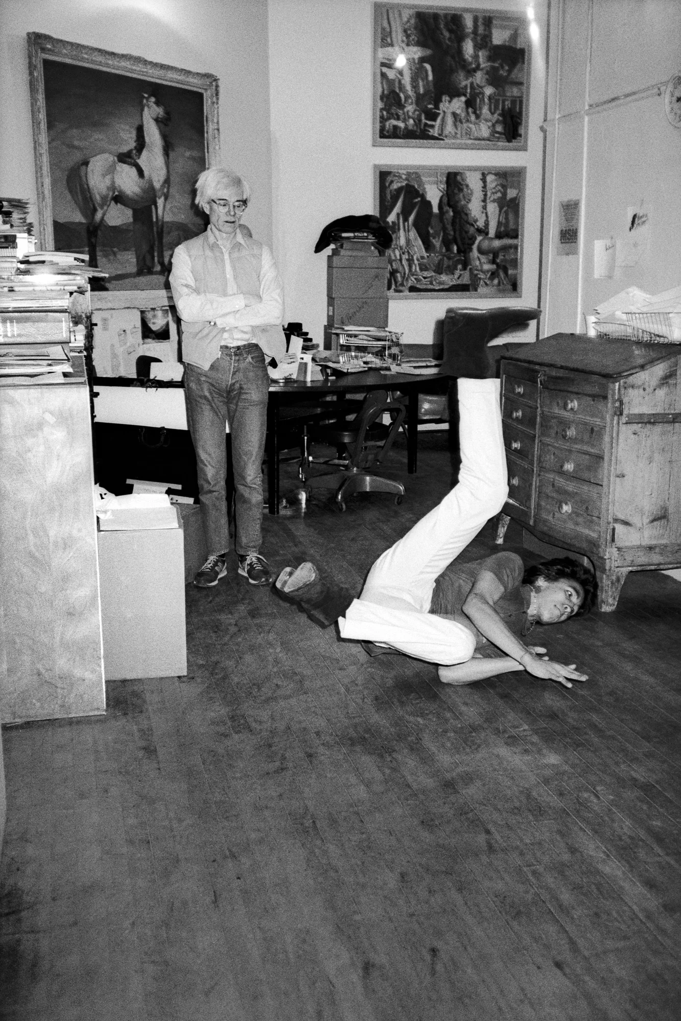 Andy Warhol with artist/break-dancer Doze Green, 860 Broadway. (1982)