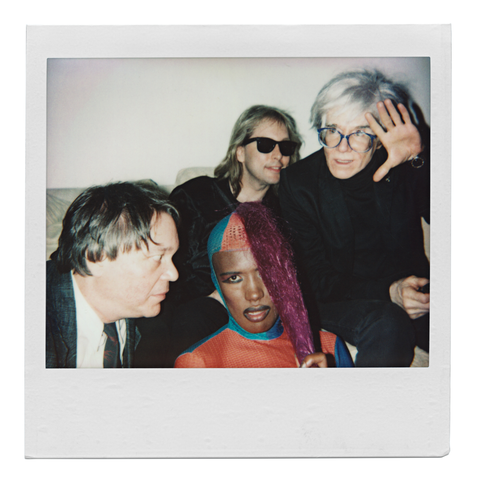  Diamantaire John Reinhold, author Beauregard Houston-Montgomery, singer Grace Jones and Andy Warhol. (1985) 