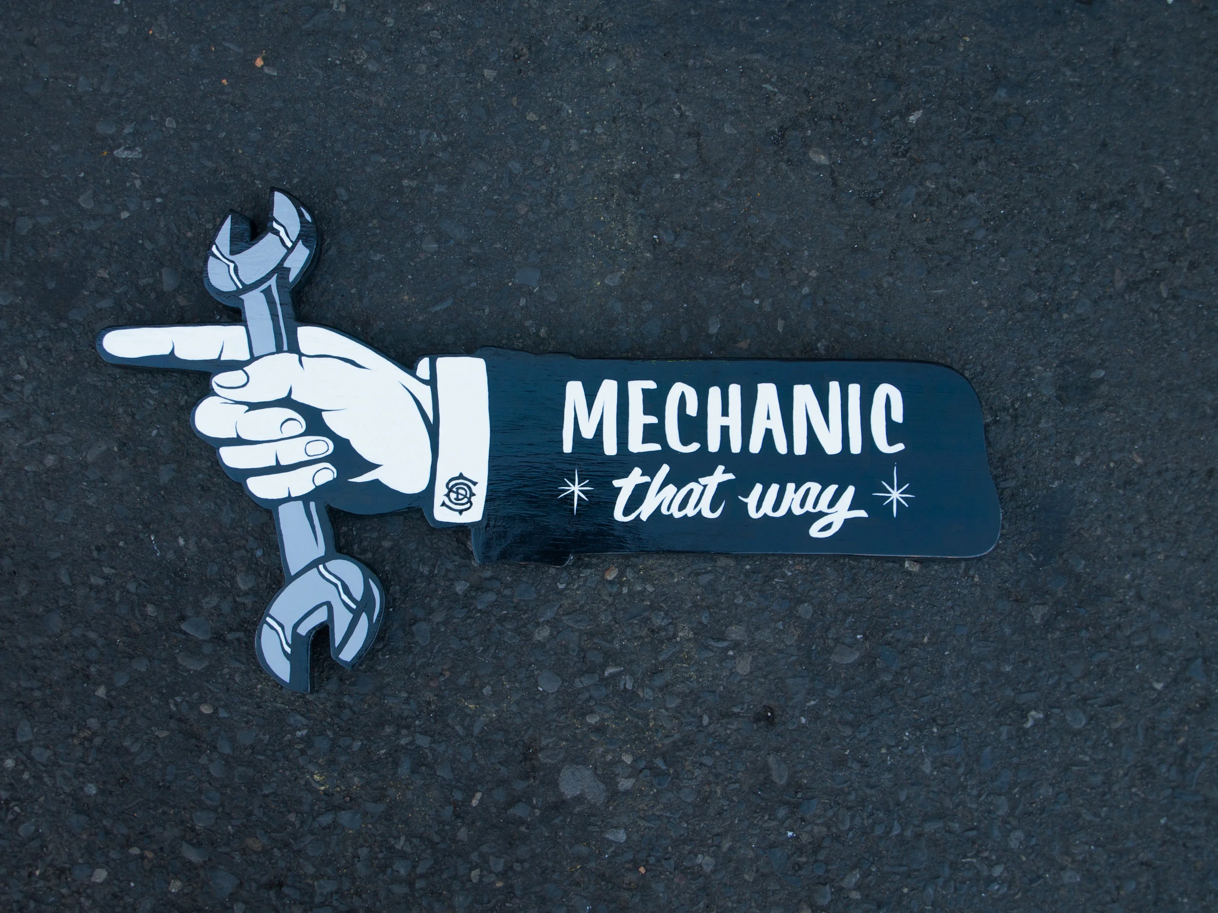 Wayfinding sign for Overhaul Design Shop (now Hankbuilt ) where I interned while in school.