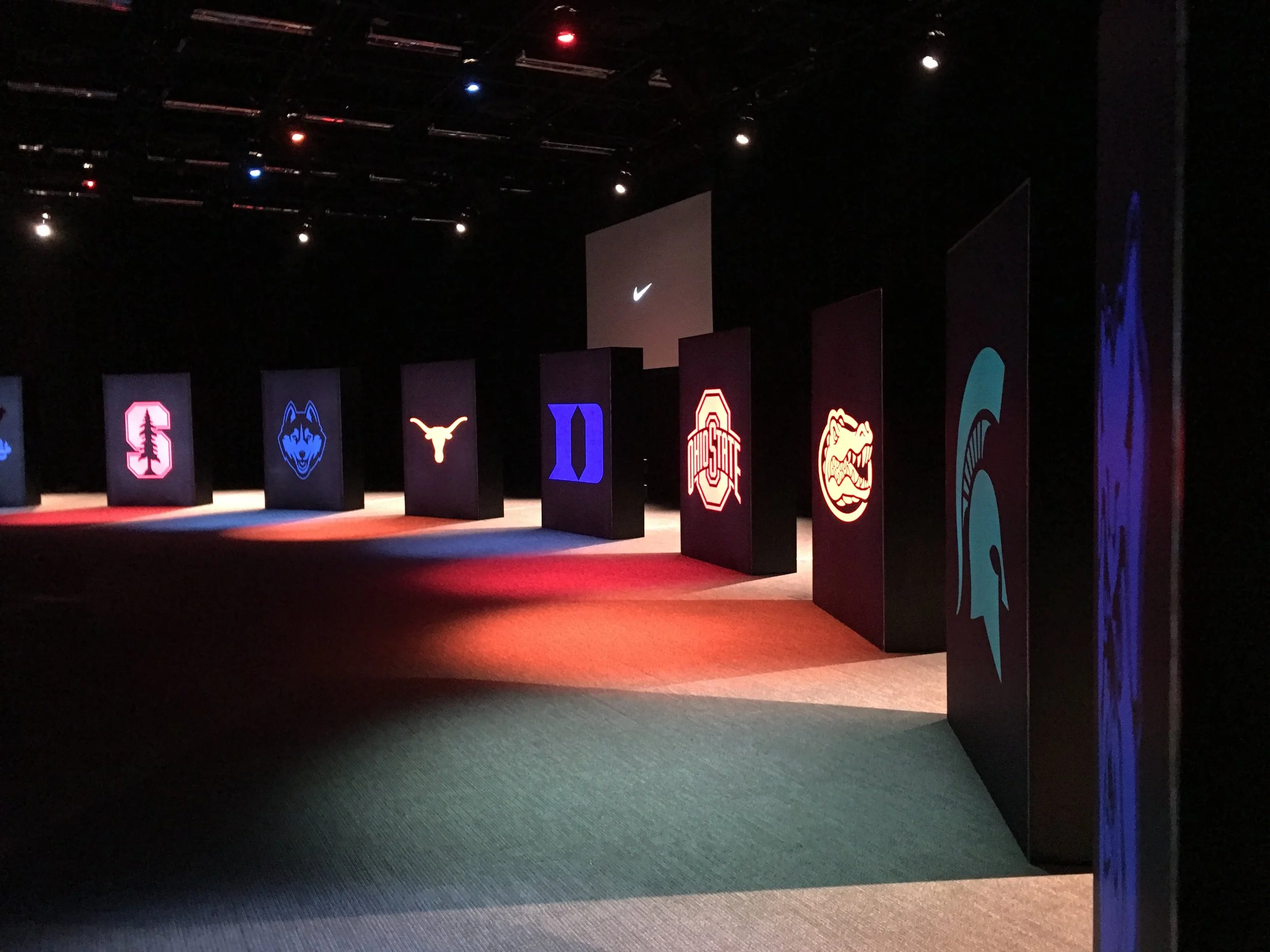  As teams moved into a dimly lit reveal room, they were met with a video message LeBron. As the screen faded to black, a lightbox featuring their school’s logo and color lit up.  