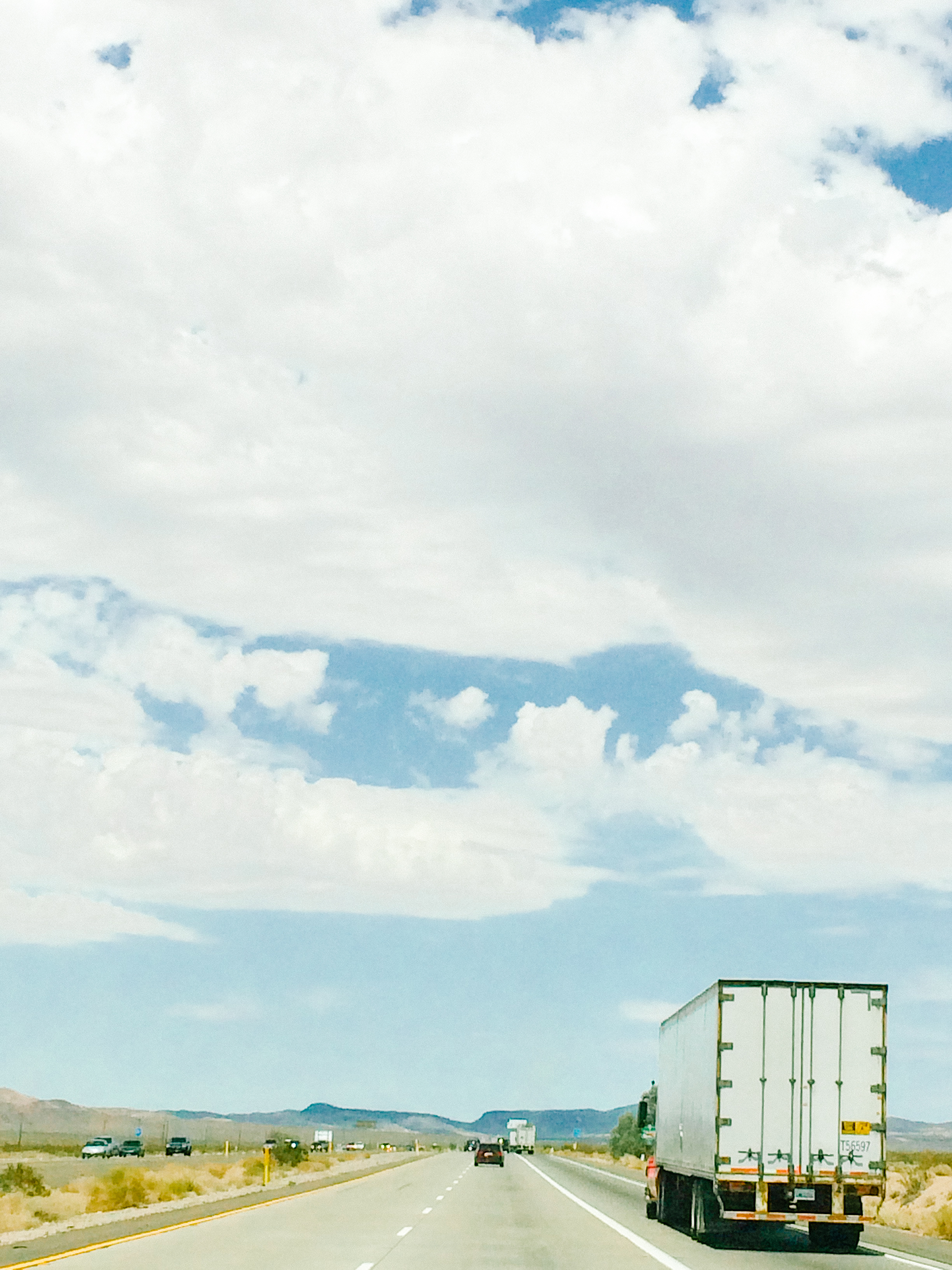Enjoining the beauty of the clouds along the highway.