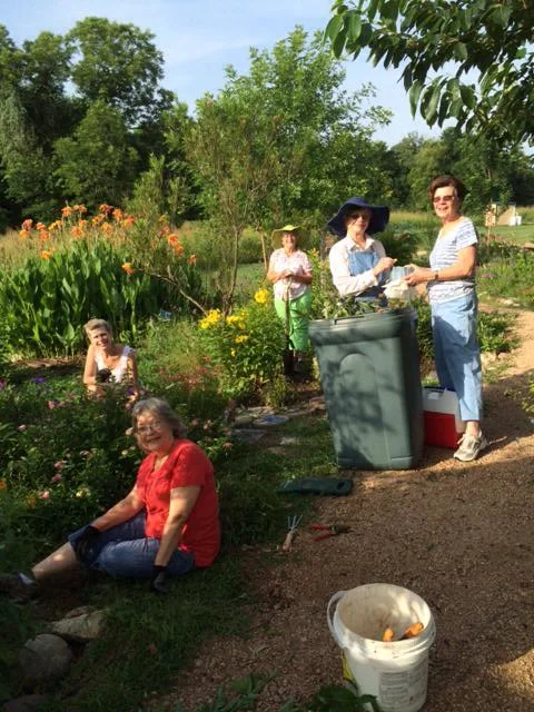 Cleaning up the garden...Scottie Davis, Debbie Urquhart, Carolyn Sander, Twila Tate. Ann Lehmann serving Cookies.