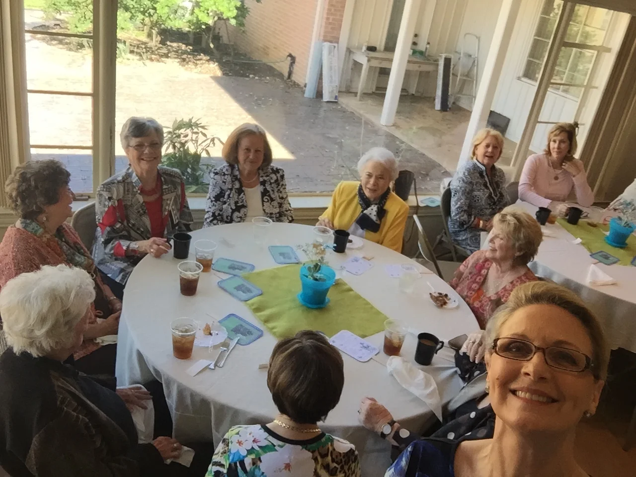Here they are (a couple of them...) in a candid photo as we sat down to lunch. Our first "garden club selfie" and a photo bomb by photographer, Sandy Batt.