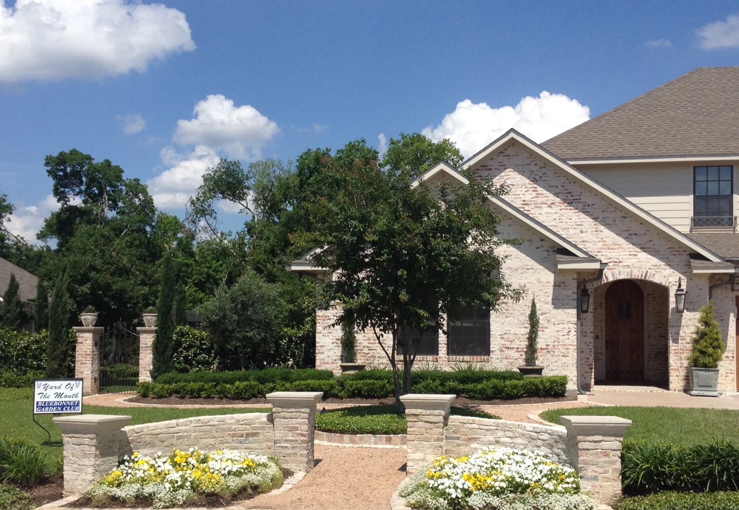 The Bluebonnet Garden Club has awarded the Yard of the Month for May to Carol Haenel of 2403 Ryan Street. The front yard is beautifully landscaped with Crepe Myrtles, boxwood hedges, ornamental pear and olive trees. Bright yellow and white pansies welcome the visitor at the street. The walled side garden is screened with star jasmine with the focal point being a lovely sculpture that can be seen through the iron gate. The back yard centers around a fountain with a lovely arbor covered with wisteria. Decorative planters filled with Japanese Yew and juniper accent the walk to the front door.
