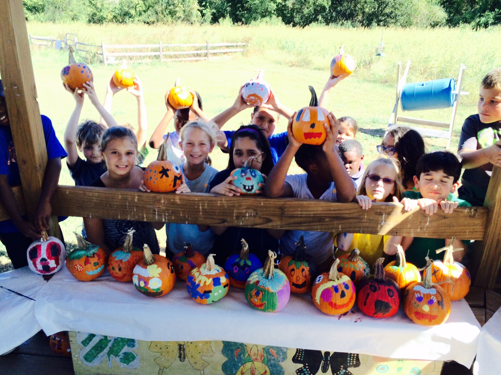 Kids with Painted pumpkins.jpeg