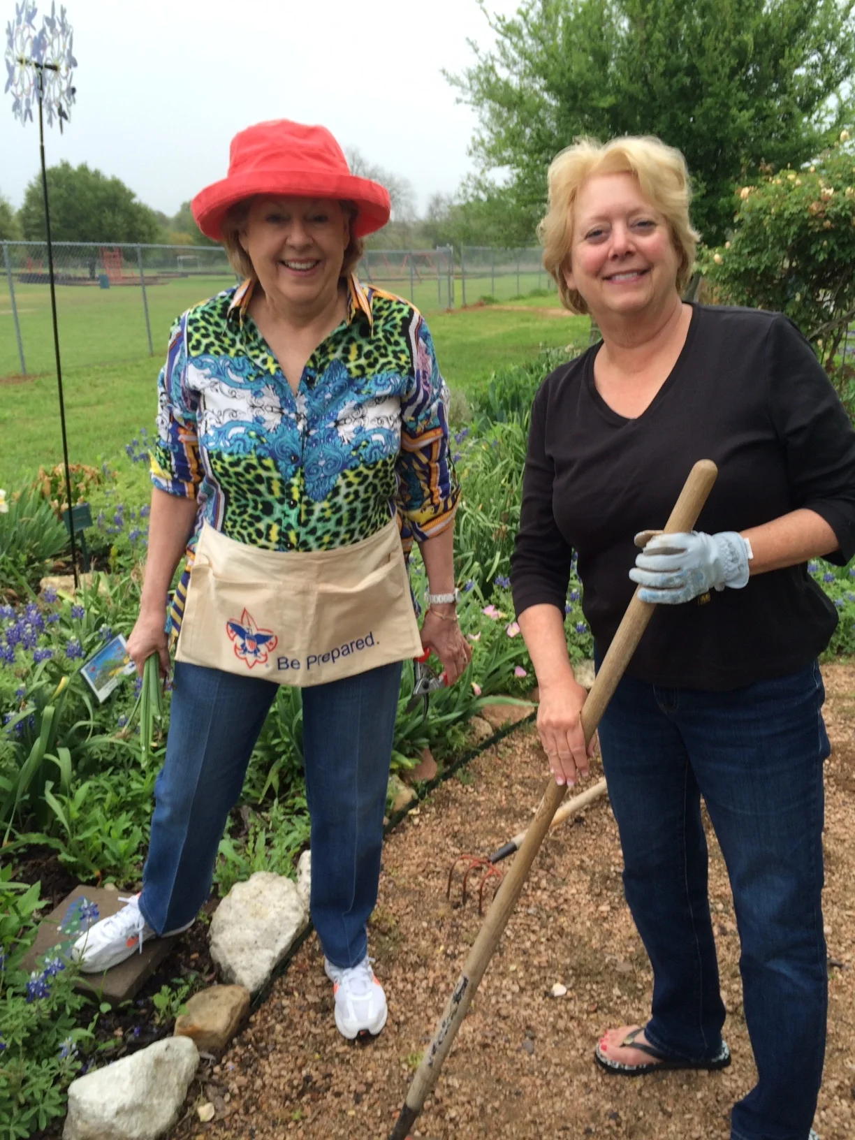 Betsy Striegler and Linda Blum help the "weekly Weeders" with garden maintenance. A donation by a member will be used to purchase a tree to be planted along the path of the outdoor learning center in an Arbor Day program. (Reported by: Twila Tate)