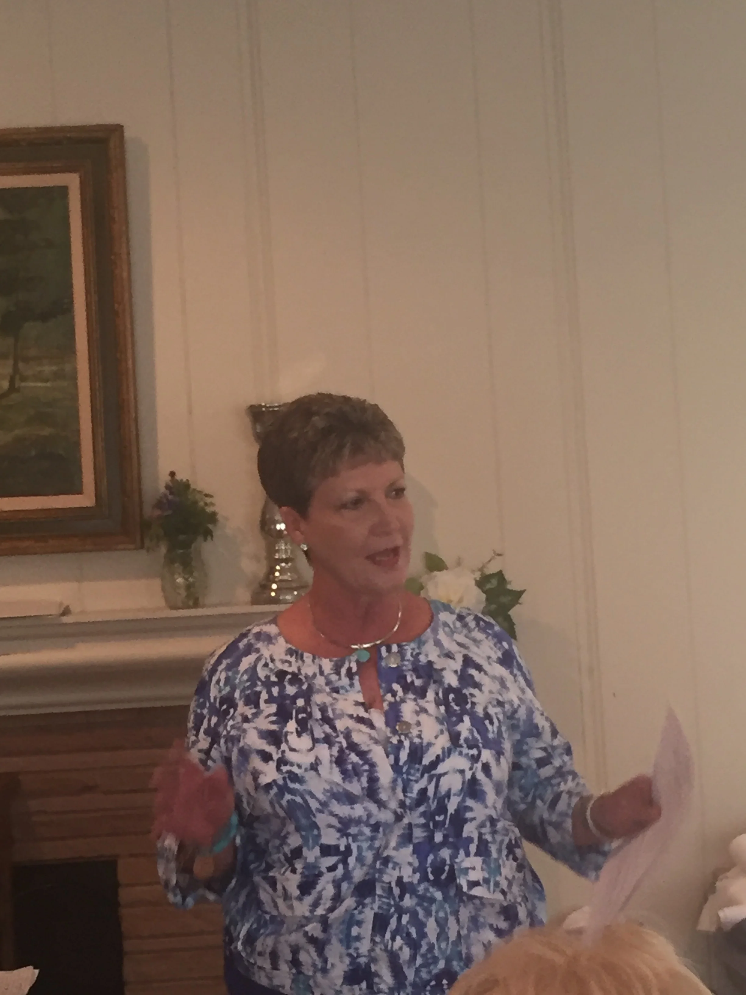 Debi Meschwitz, Flower Show Chairman explaining the ins and outs of creating a tablescape and giving last minute instructions about members' duties on the big day!