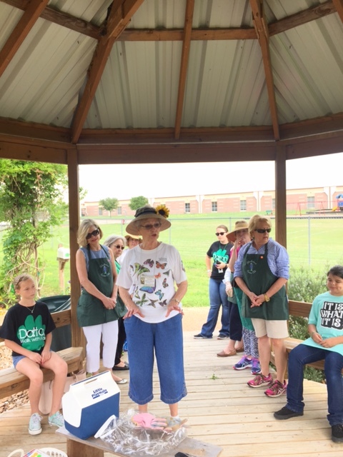 Twila Tate, Youth Gardening Chairman, talks to the students about what is happening in the garden in the Spring of the year.