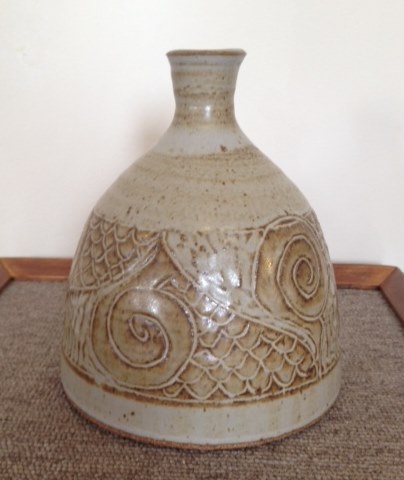 Carved stoneware vase