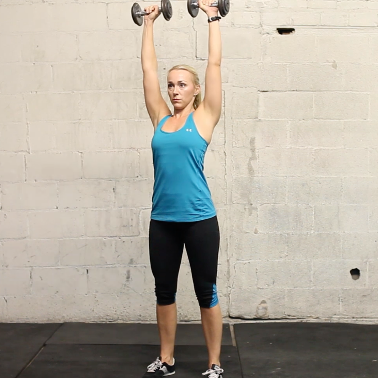standing dumbbell overhead press
