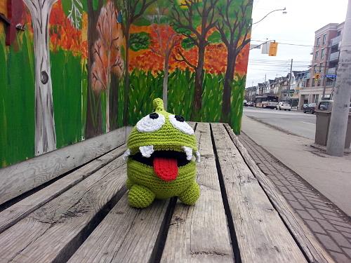  Once Om Nom #1 was done, I took some action photos of him. Here he is at the bus stop... 