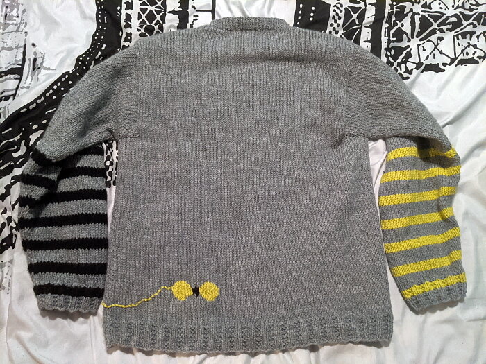 orange cat pullover, back