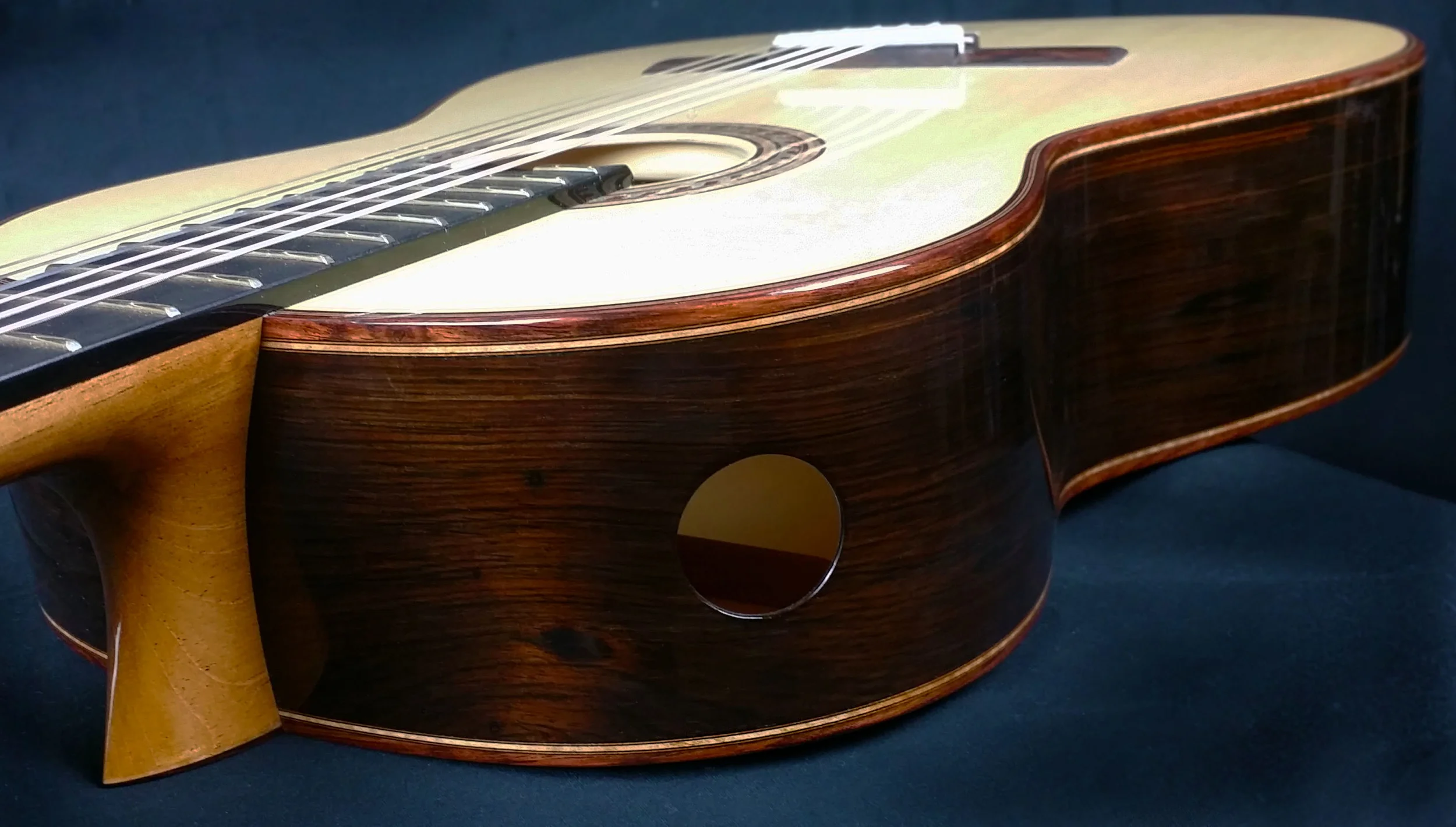 brazilian rosewood with honduran mahogany binding and curly maple purfling