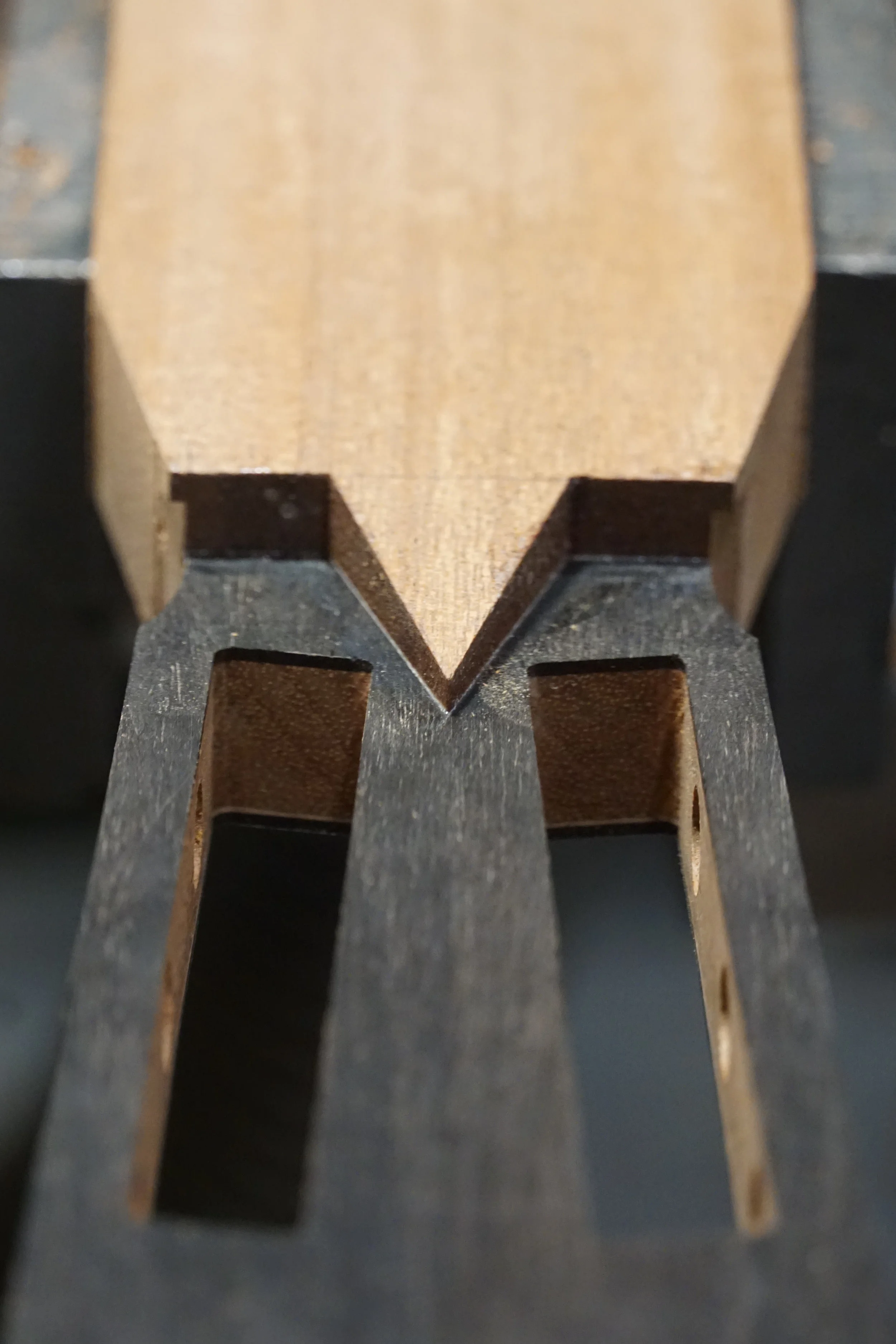 v-joint, headstock is veneered with ebony