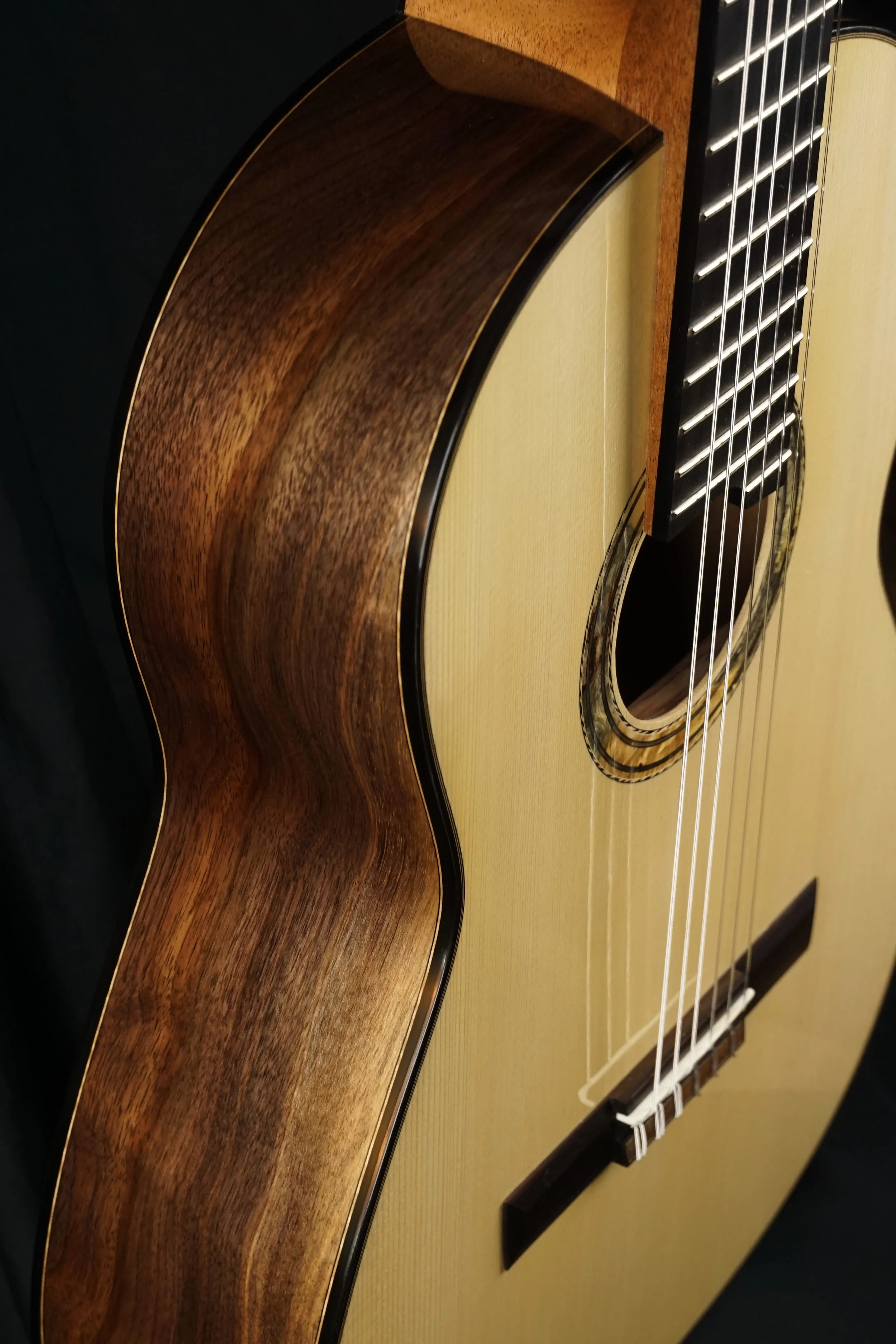 claro walnut sides with ebony binding
