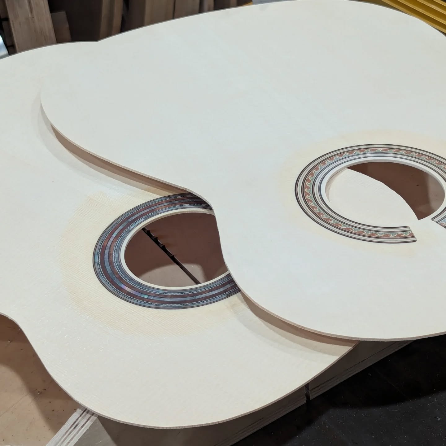 Here's the next 2 guitars getting started.  One with one of my standard rosettes and another one off with a bunch of black mother of pearl added.