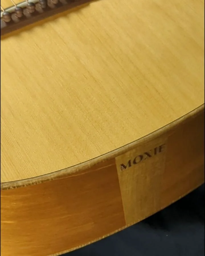 Here's one of the rare steel strings I make a year. 00 -12 size with a slotted head.  This has got some cool vibes and the Kauri wood really pops under finish.  Doing the final setup tweaks and then it will be on its way. 

#ancientkauri #portorfordc