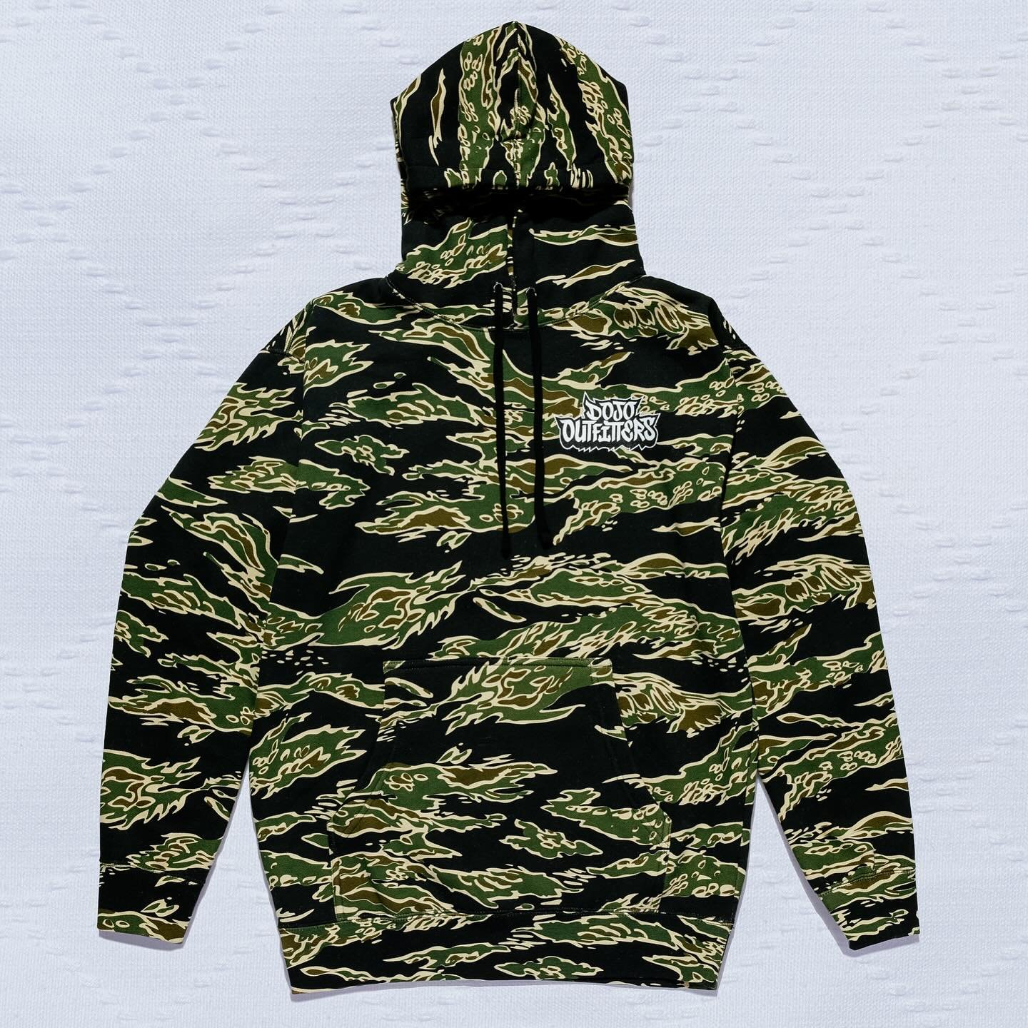 Perfect for cold weather and exceptionally thick, our &ldquo;Tora&rdquo; tiger stripe camouflage pullover hoodie features a 5&rdquo; printed logo on the left chest. 
.
🐅 Click the link in our bio for purchase!
.
Trips to and from the dojo just got a