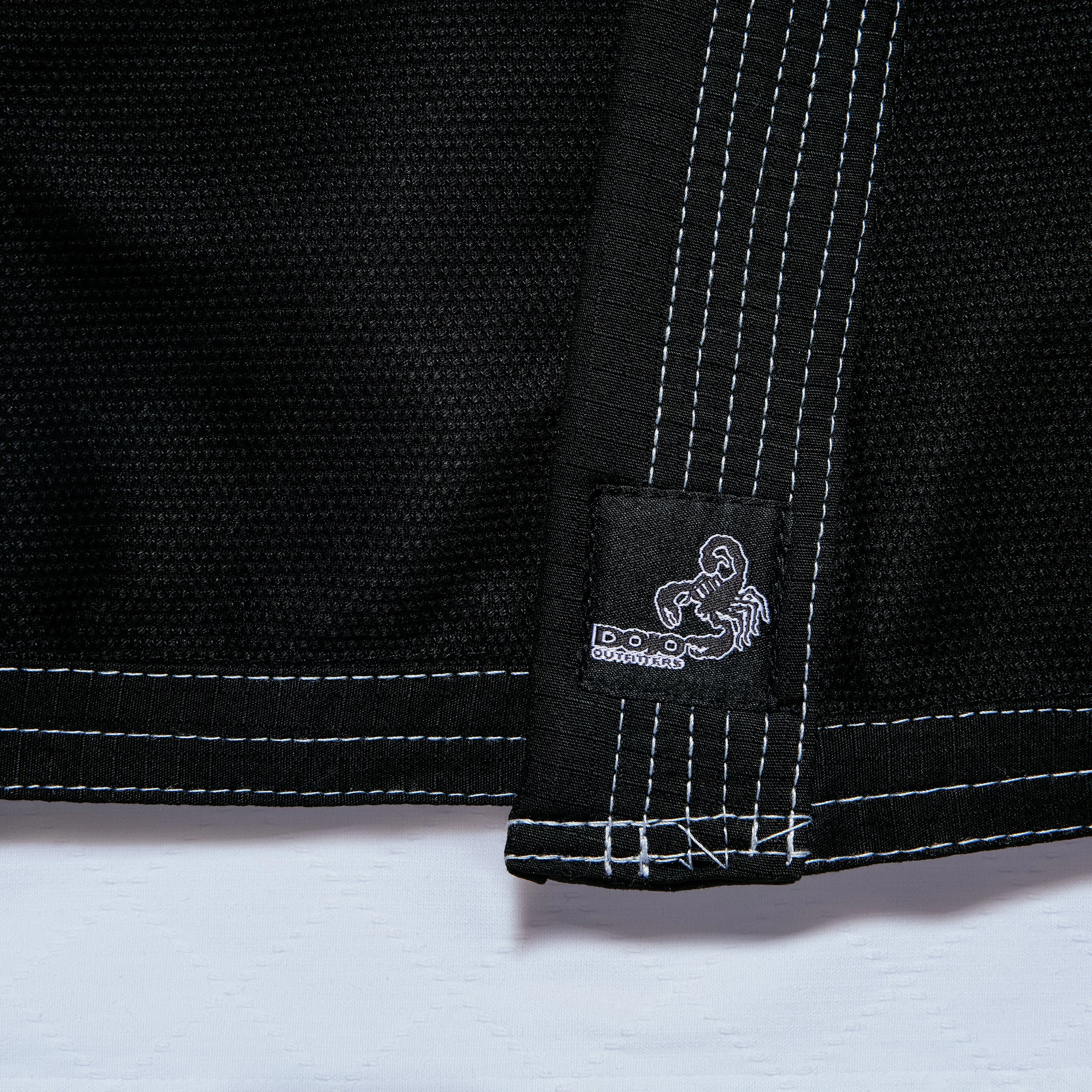 Dojo_Gi_Inherently-Combative_Black-White_11624.jpg
