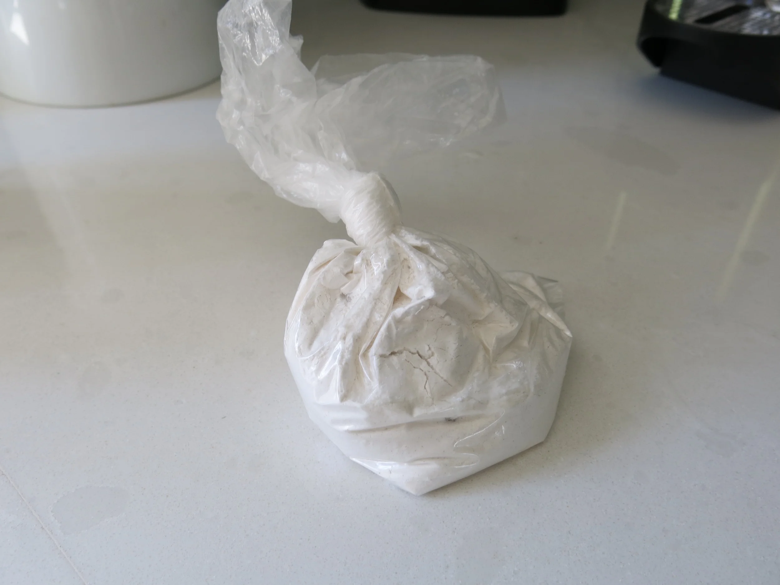 Unidentified white powder.