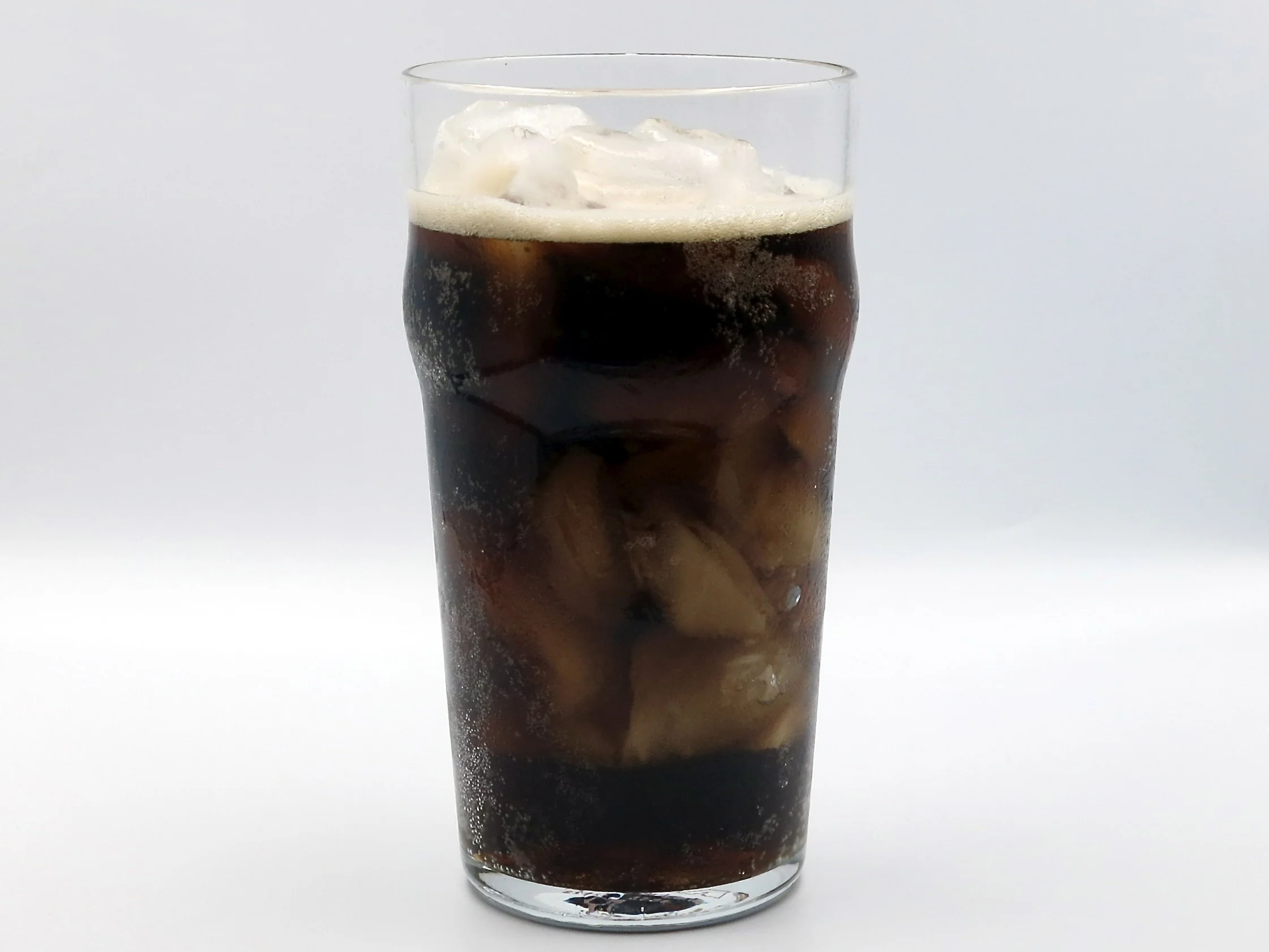 A glass of Mole Cola.