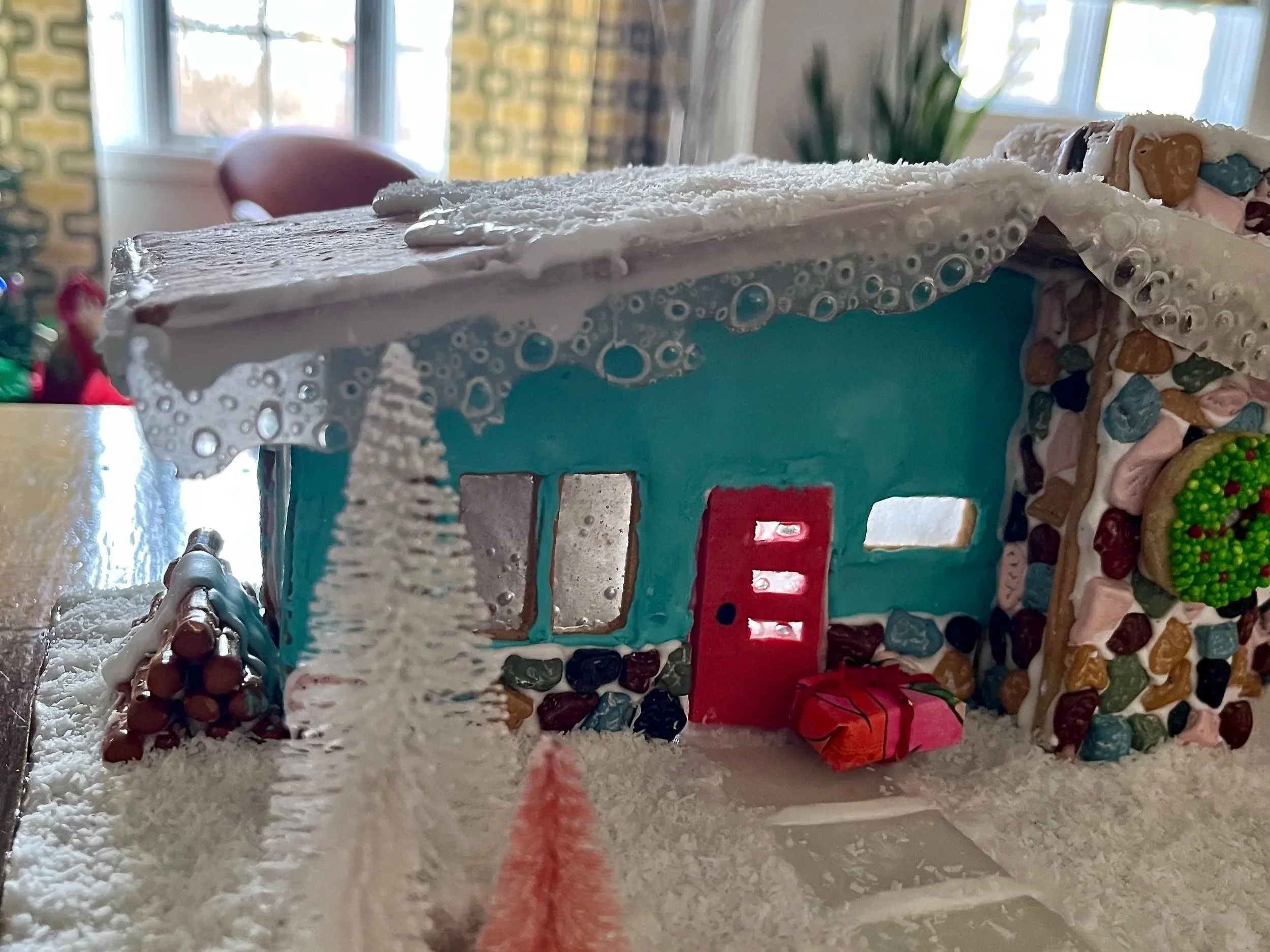 A close up of a mid-century gingerbread house.