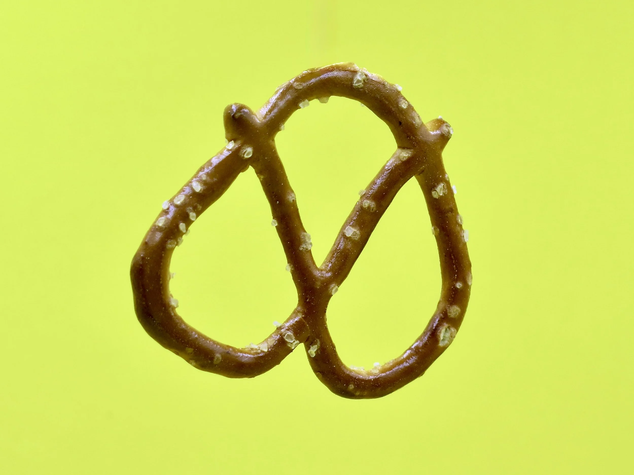 A single Rold Gold brand pretzel.