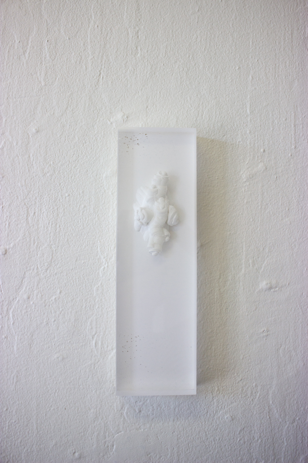  Untitled (drilled plexi)  2015  Acrylic panel with drill marks,&nbsp;painted gallery white  10 x 3 x 1 inches 