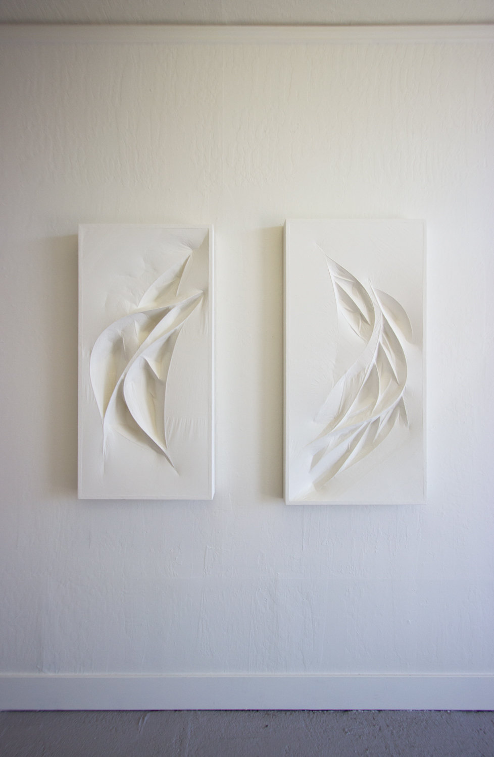  Untitled 1 &amp; 2 (white forms)  2015  Wood panel, wood forms, and paper mache (white tracing paper with gallery white paint)  45 x 23.5 x 4 inches, 47.5 x 23.5 x 3 inches 