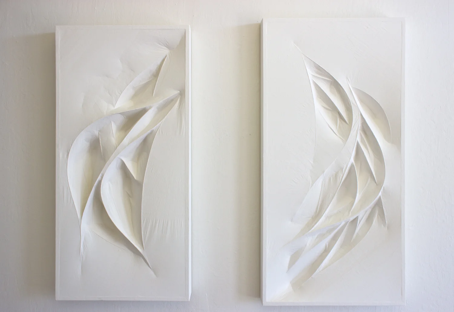 Untitled 1 & 2 (white forms) 2015 Wood panel, wood forms, and paper mache (white tracing paper with gallery white paint) 45 x 23.5 x 4 inches, 47.5 x 23.5 x 3 inches
