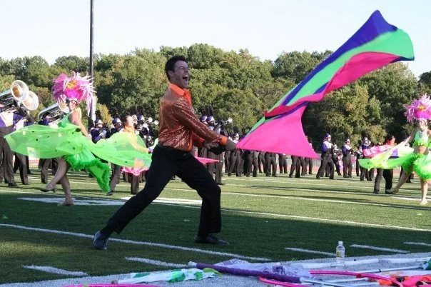 POV: the audience has to see your expression from across a football field. Unhinge your jaw and use 100 yards of fabric. - WCU Color Guard