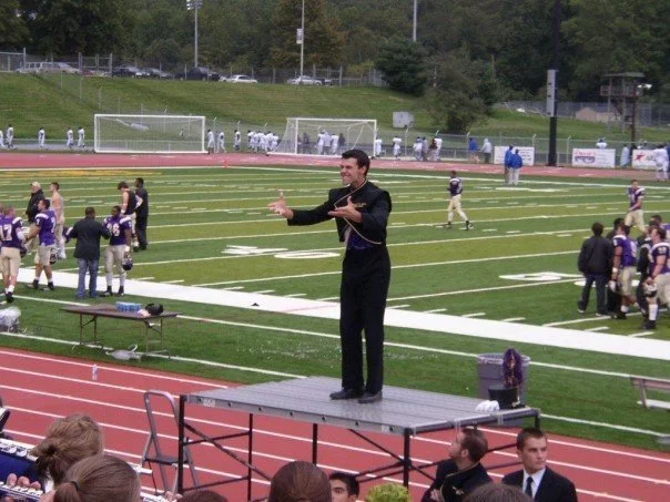 Leading the 300 member Incomparable Golden Rams Marching Band gets a little intense. MORE VOLUME!!