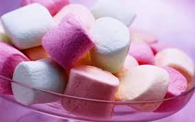 I love marshmallows and wouldn't mind sleeping on a bed made out of them or playing with them in bed. 