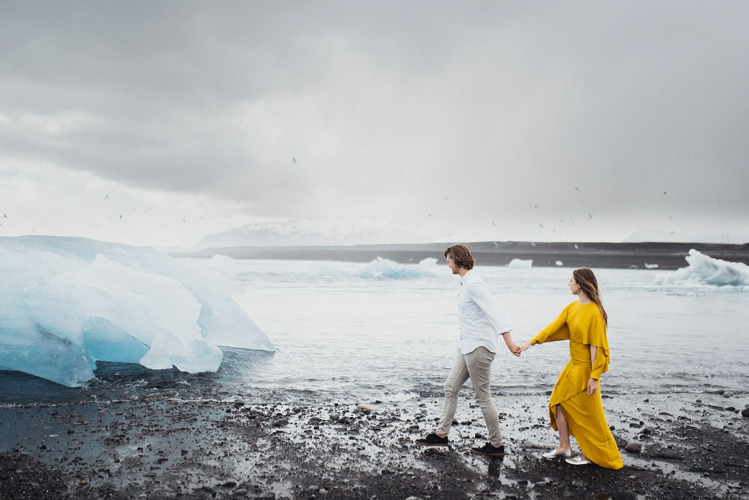 couple at diamond beach iceland
