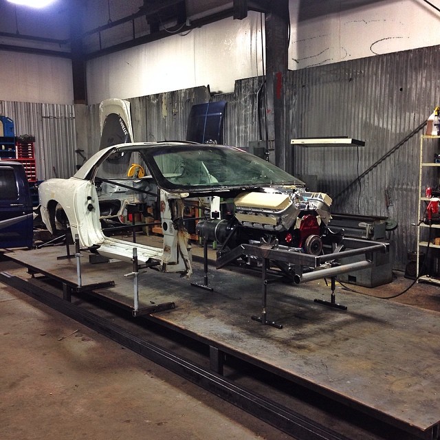 Another veiw of it. The table works awesome for fixturing. All that time of drilling and tapping is paying off. On another note, unfortunately my hopes of a flat hood got crushed today. #300mphorbust #firebird #carmaperformance #myfbodysgotabigblock
