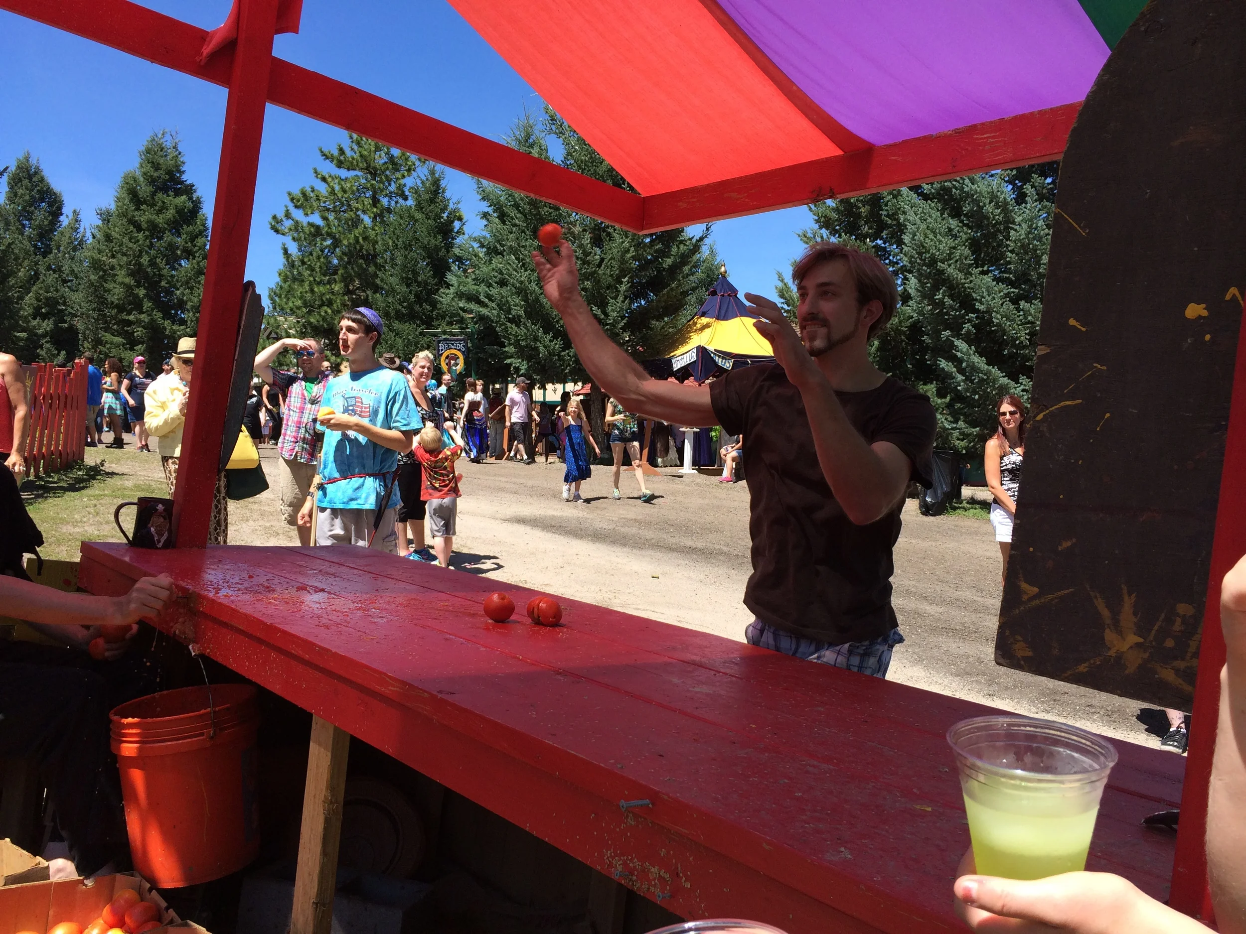 Scott throwing some tomatoes at a guy who was heckling him.