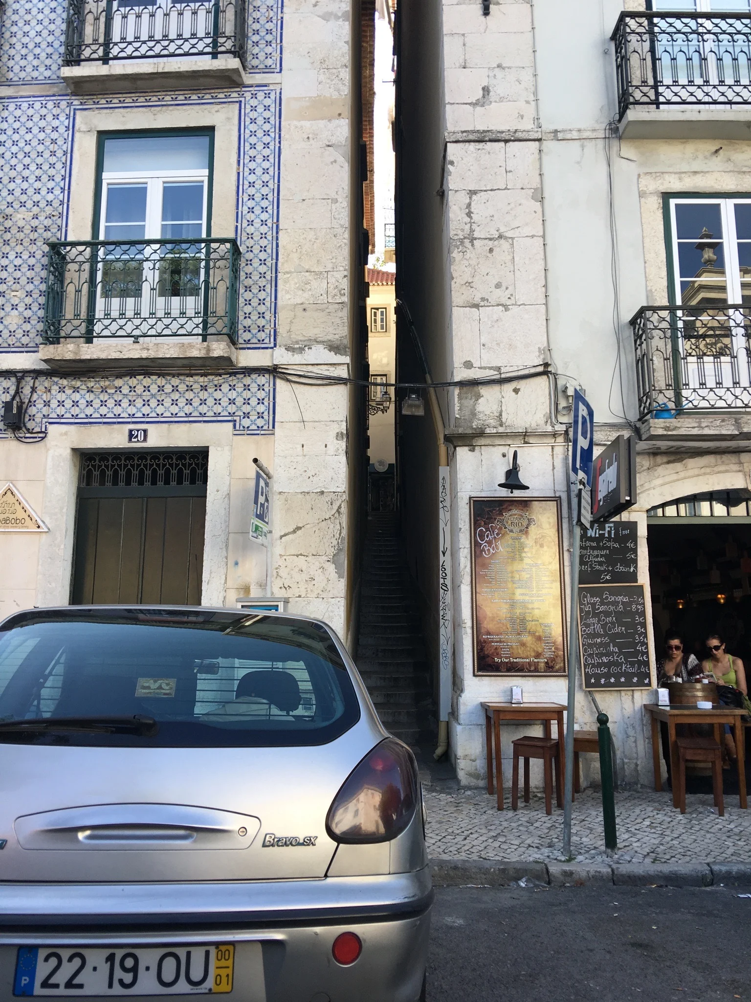 The narrowest street in Portugal, Escadinhas Do Terreiro Trigo , in the Alfama district